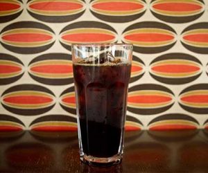 Cold Brew Coffee Recipes are easy and make both tasty and pretty cold brew coffee like the tall glass filled with ice and cold brew Ladro coffee