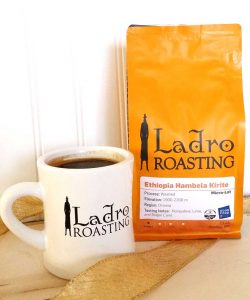 Cup of coffee in a Ladro Roasting mug and a bag of Good Food Awards 2018 Ethiopia Hambela Kirite
